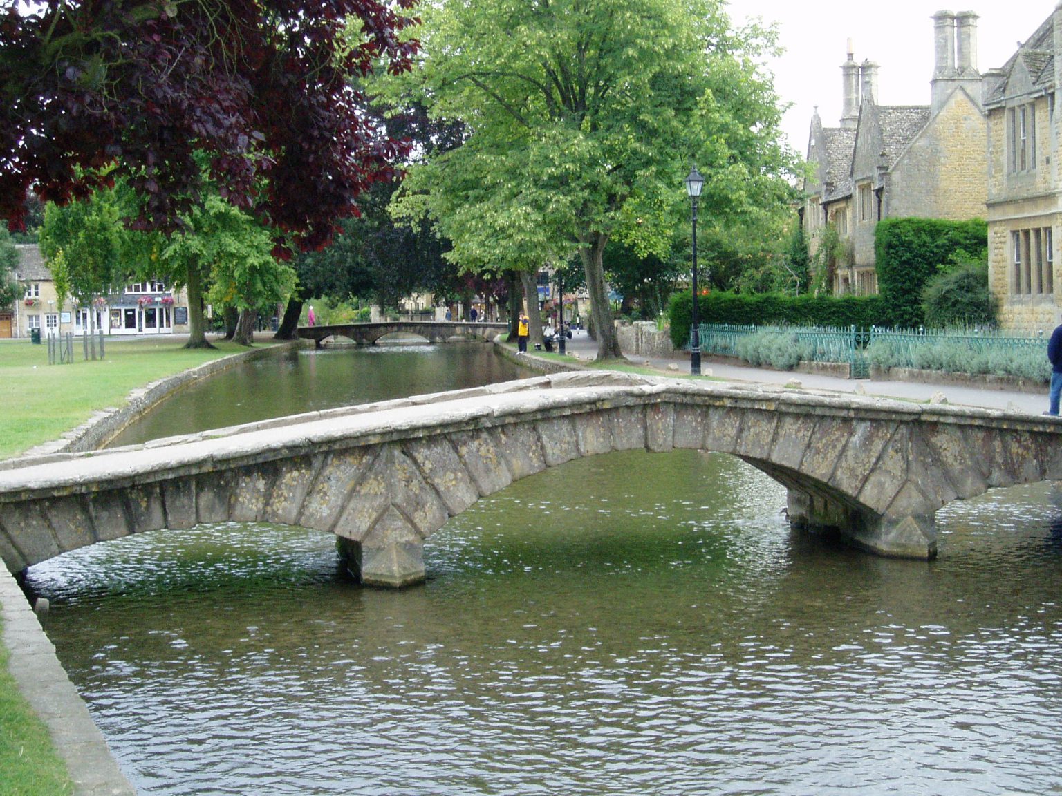Stone footbridges over the River Windrush at Bourton-on-the-Water, Cotswolds